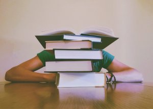 Anxious teen handling the workload of college 