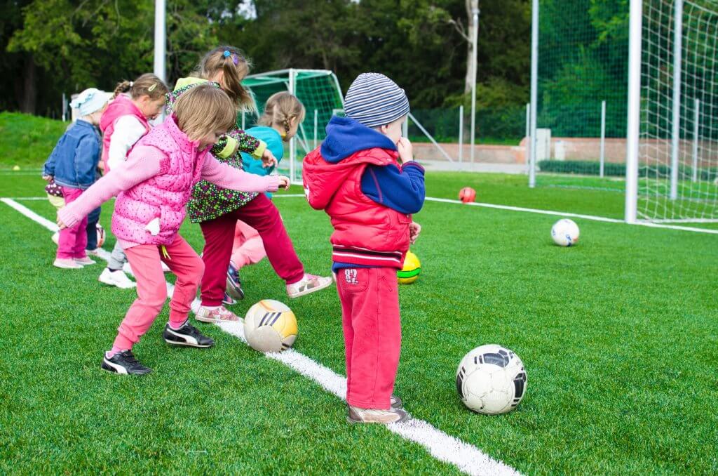 First grade children doing an extracurricular activiity