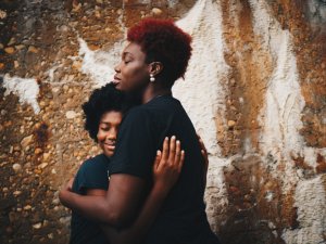 Mom and daughter hugging