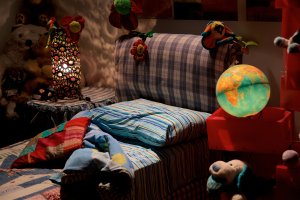 A close up of an empty seat surrounded by kids toys. This could represent a bedtime routine that child counseling in Branchburg, NJ can help you enforce. Learn more about child therapy by contacting a child psychologist. They can offer child therapy in Branchburg, NJ and other services.