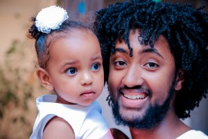 Overwhelmed parent holding daughter