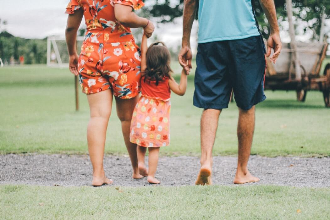 Parents and child walking away from the camera. Can food allergies cause panic attacks? Yes! That's why anxiety therapy new jersey is great for parents of children and teens with food allergies new jersey. Westfield NJ counseling can help you cope with an anaphylactic reaction new jersey now.