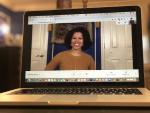Woman on her computer doing online therapy in New Jersey with a skilled online counselor from Brave Minds Psychological Services