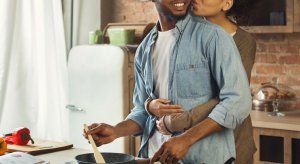 Woman standing behind their partner has her arms wrapped around him. He are looking to the side as he cooks something in the frying pan, and she kisses his cheek. Not every day may be as happy as this one, but Brave Minds Psychological Services offers couples counseling in scotch plains, nj, and couples therapy in westfield, nj. Contact us today for support with your relationship issues.