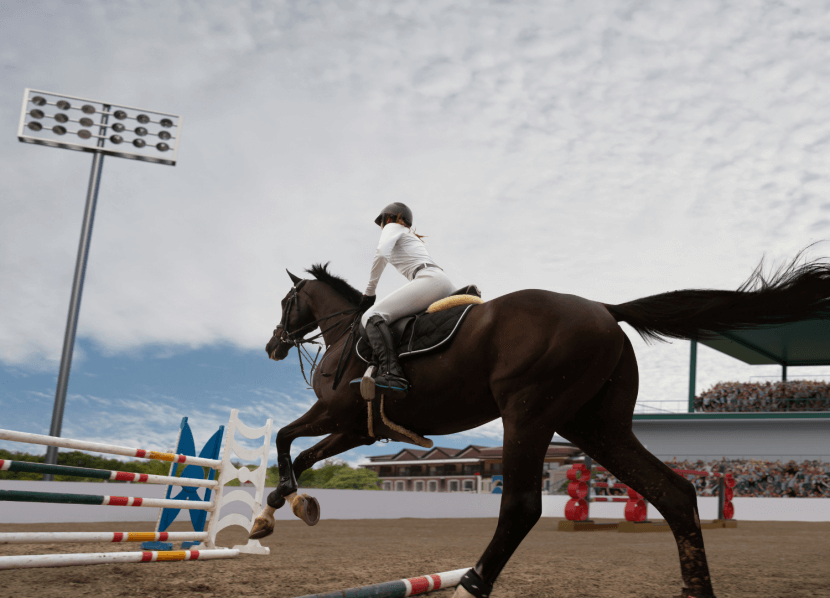 A dark brown horse galloping, preparing to jump. The rider is wearing all white with black boots.