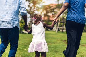 African American family walk in the park while holding hands. Parent counseling in Scotch Plains, NJ can offer support in combating rape culture. Learn more about sexual violence support in Scotch Plains, NJ today. Parenting help in westfield, NJ can help you and your child today!