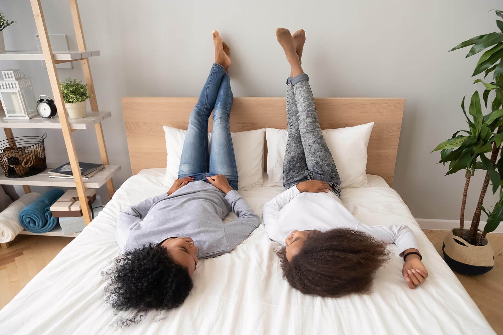 A mom and teen girl talk to one another as they lay on a bed. this could represent receiving support with sexual violence prevention in Scotch Plains, NJ today. Online therapy for sexual assault in New Jersey can offer you sexual violence support today. 07076