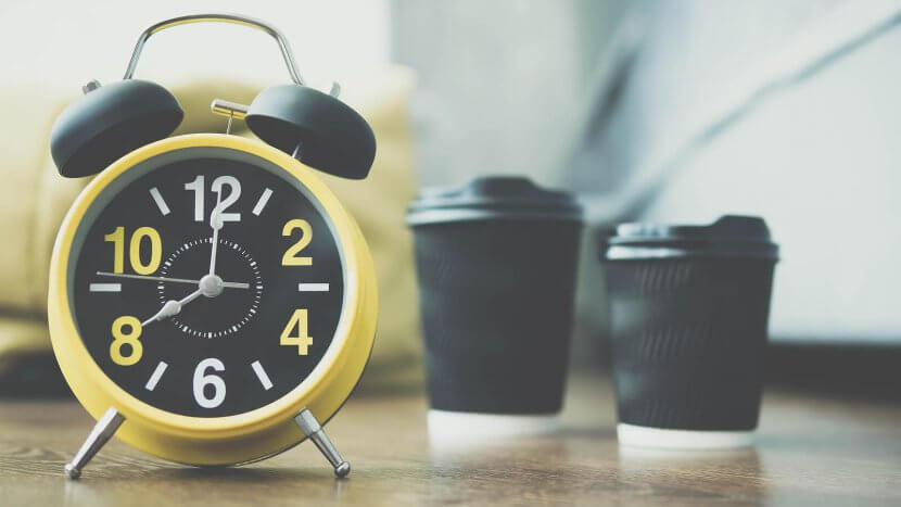 Image of a yellow old style alarm clock with two cups of coffee behind it. Parenting Advise Scotch Plains, NJ, Parenting Help in Scotch Plains, NJ, Parenting Counseling in Scotch Plains, NJ | 07076