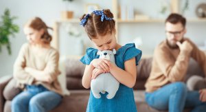 Image of a sad child holding a bear in front of her upset parents. Narcissistic abuse can affect people of all ages. That is why we offer EMDR therapy for kids in Scotch Plains, NJ 07076.