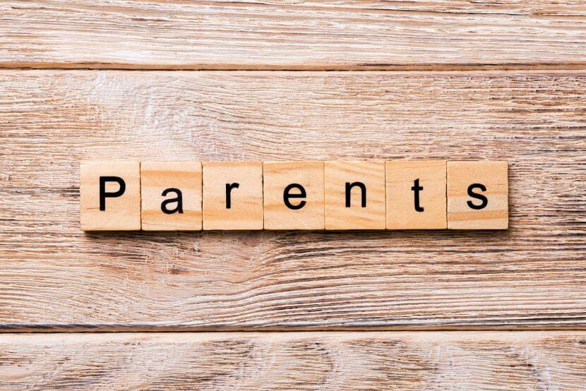 Image of parents spelled out in scrabble letters on a wood background. Anaphylactic reaction in New Jersey gives parents, kids, and teens. Get help with online therapy for teens and child therapy for anxiety in Scotch Plains, NJ 07033.