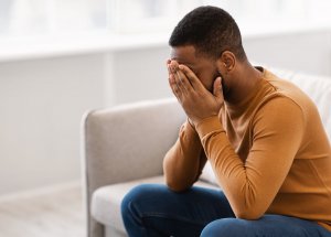 Image of a man with his hand in his hands. All members of the family are affected by allergies and anxiety in Scotch Plains, NJ 07076. Start anxiety treatment of food allergies and anxiety. 07091 | 07033 | 07016