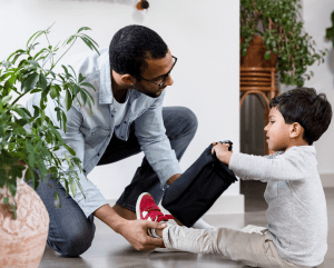 Image of a man and his son. How to help your kids after a school shooting. Get parenting help in Westfield, NJ 07016. An online therapist can also help you with anxiety treatment in Cranford, NJ 07033. 07091 | 07076