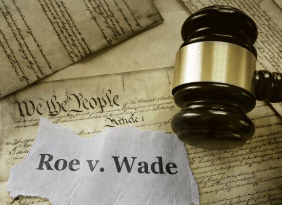 Image of the constitution, a gavel, and a paper that says Roe v. Wade. Learn self-care Roe vs Wade Tips from a trauma therapist in Scotch plains, NJ. Reach out and we can help you with trauma therapy and EMDR trauma therapy in New Jersey.