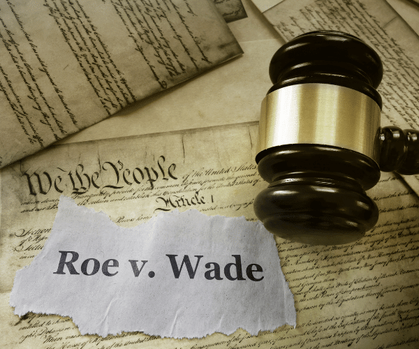 Image of the constitution, a gavel, and a paper that says Roe v. Wade. Learn self-care Roe vs Wade Tips from a trauma therapist in Scotch plains, NJ. Reach out and we can help you with trauma therapy and EMDR trauma therapy in New Jersey.