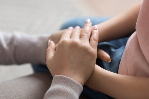 Image of a pair of hands laid on top of someone else. Parenting teens is hard but we provide parenting help in Scotch Plains, NJ 07091. Get parenting advice from a teen counselor in Scotch Plains, NJ 07033. Call today to talk about counseling for teens in New Jersey. Reach out now!