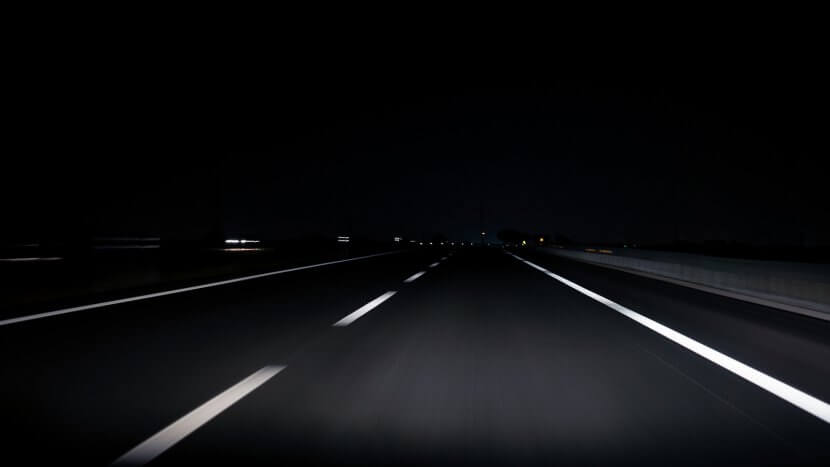 Dark road in the middle of the night. Driving anxiety treatment in Cranford, NJ can help you thrive.