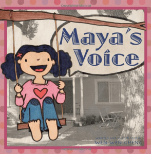 An illustration of a young girl on a swing with a joyful expression on her face. Text reads: Maya's Voice. Showing one example of a book that parents and a child therapist can use to explain selective mutism to children. As well as how child therapy for anxiety can help.