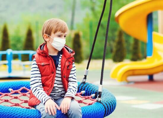 Image of a boy sitting on a swing at the park by himself showing the struggles that child therapy for anxiety can help address. A child therapist in Scotch Plains, NJ could help him by addressing his selective mutism.