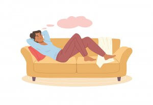 Woman lays on a couch thinking. Thinking about how to handle stress and anxiety over food allergies? Our food allergy therapists in Branchburg, NJ can help you!