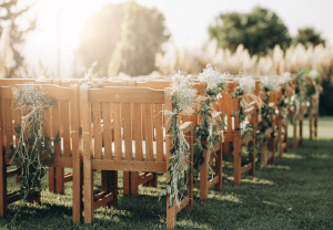 wedding day setup with chairs and flowers, exemplifying the light at the end of the tunnel of wedding planning. Weddings can be hard, complex, and strenuous. Look for a couples therapist in Scotch Plains or Branchburg, NJ to find help recovering from your wedding.