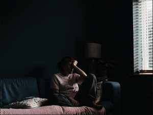 Image showing the emotional toll infertility can take on an individual. Seek a therapist to help with the emotional stress of infertility today!
