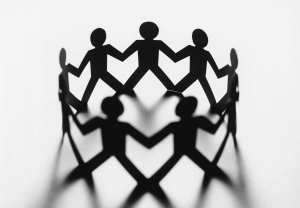 Image of multiple people holding hands, showing support of each other through a difficult time. Look for a therapist for more support by searching for one in Scotch Plains or Branchburg, NJ today!