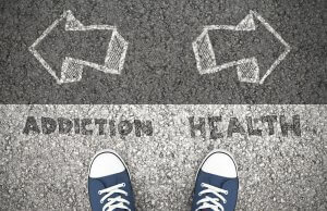 A top down view of shoes standing above different facing arrows for addiction and health. Learn how a couples counselor in Branchburg, NJ can offer support for addressing addiction. Search for Scotch Plains therapy to learn more about therapy Branchburg, NJ and other services.