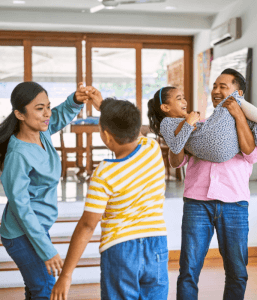 A family taking some time to dance together, sharing the moment in a safe place. Providing a safe place at home can be how you can help manage anxiety in a child and find ways to provide positive coping mechanism for when your child feels anxious. Find a child therapist in Scotch Plains or Branchburg today!