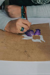 A person experiencing emotional distress during an art therapy session with a trauma therapist in Branchburg, NJ. Art therapy provides a safe space for processing racial stress and trauma at our healing center serving Branchburg, Somerville, and surrounding areas.