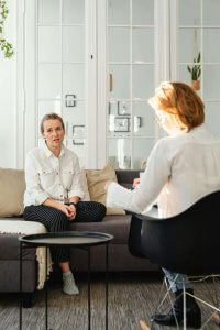 Therapist for neurodivergent adults in New Jersey offering neurodiversity affirming therapy during a supportive session in a calm, inclusive environment.