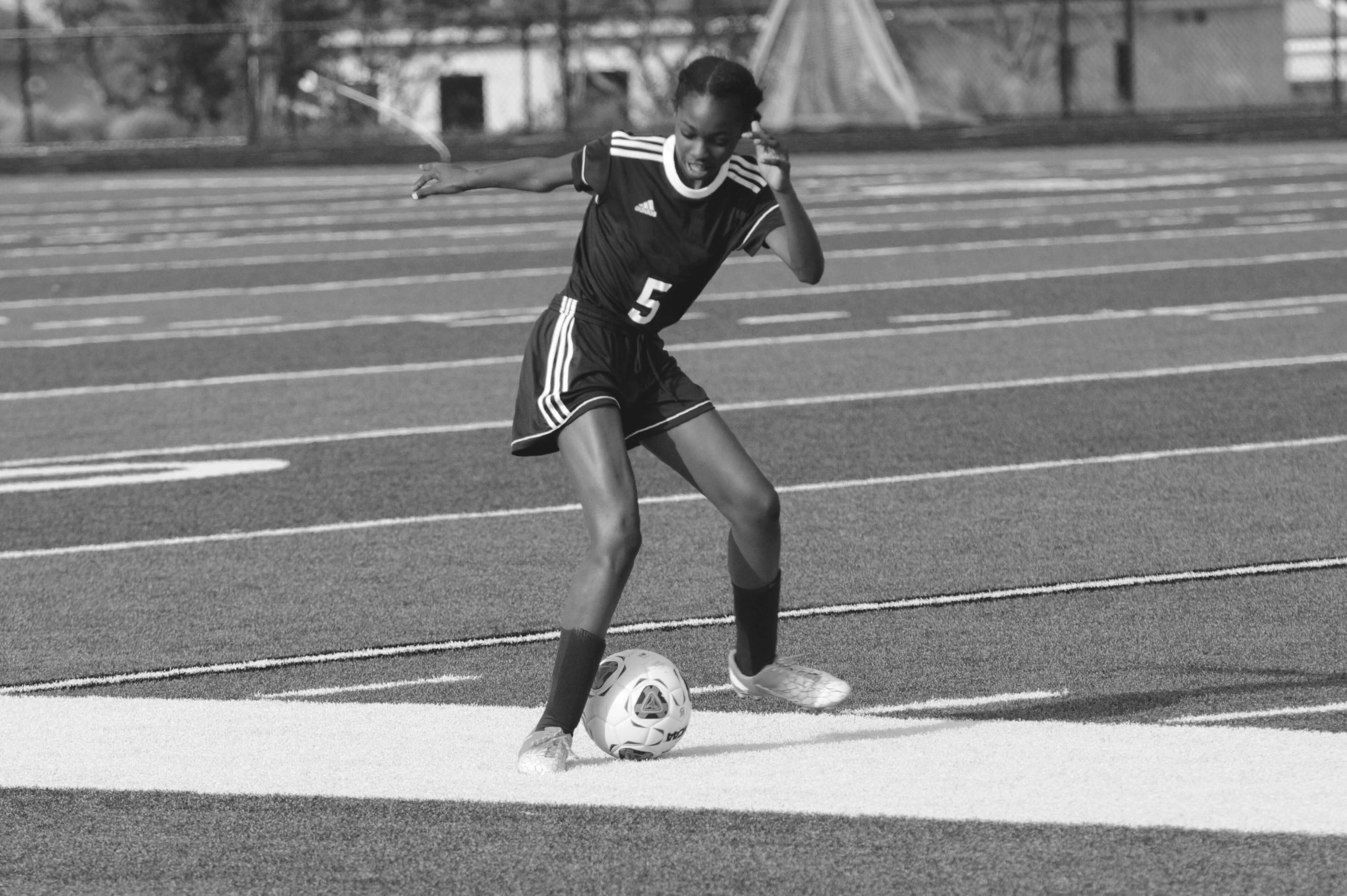 Young soccer athlete competing with focus and determination on the field. EMDR therapy NJ helps teen athletes break through mental blocks and performance anxiety in sports. EMDR therapist in Somerville, NJ provides adolescent therapy NJ in Branchburg and Scotch Plains NJ Brave Minds specializes in EMDR therapy in Scotch Plains, NJ and performance anxiety NJ treatment for competitive athletes building confidence. 