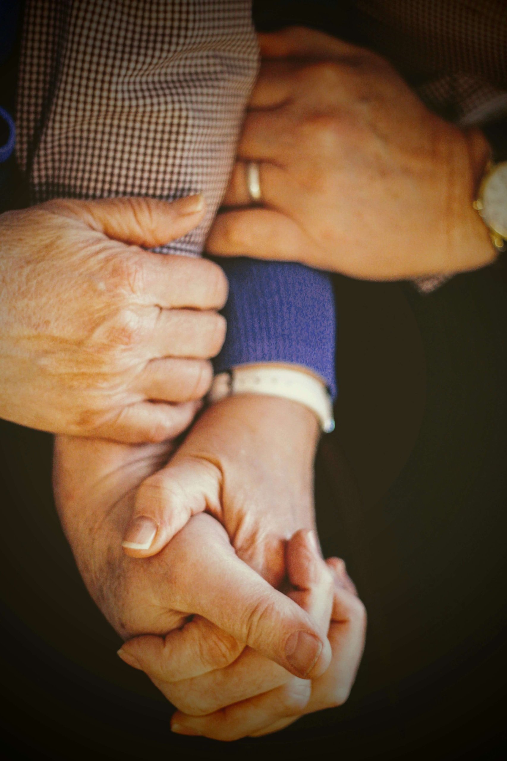 Tender hands of different generations clasped together, symbolizing the shared experience of loss and grief in Scotch Plains, NJ across all ages. What does grieving mean for families? It means supporting one another through profound loss. Grief counseling NJ helps families navigate grieving symptoms together in Branchburg, and Scotch Plains NJ 07076. Loss and grief in Scotch Plains, NJ affects entire families who benefit from compassionate grief counseling NJ addressing grieving symptoms like sadness, connection needs, and healing.