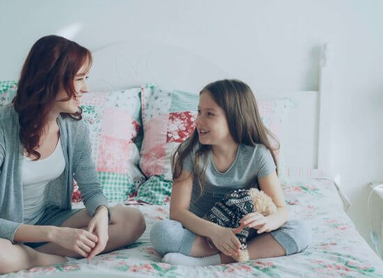 Mother having early conversation about puberty with daughter representing neurodivergent journey NJ families experience with support from counseling in Branchburg, NJ. Brave Minds provides neurodivergence NJ therapy in Somerville (08876, 08869, 08807, 08836, 08880, 08805) and neurodivergent affirming therapist services near Somerville, NJ for puberty NJ support and ADHD therapy.