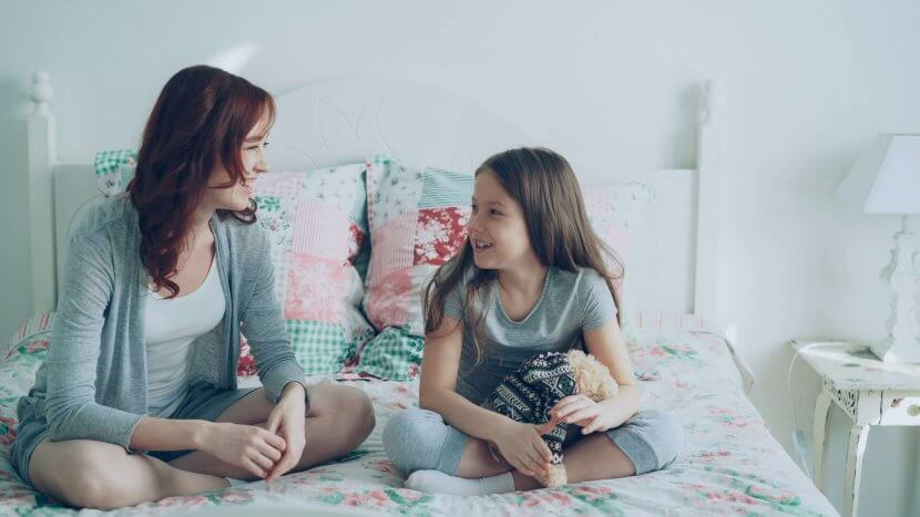 Mother having early conversation about puberty with daughter representing neurodivergent journey NJ families experience with support from counseling in Branchburg, NJ. Brave Minds provides neurodivergence NJ therapy in Somerville (08876, 08869, 08807, 08836, 08880, 08805) and neurodivergent affirming therapist services near Somerville, NJ for puberty NJ support and ADHD therapy.