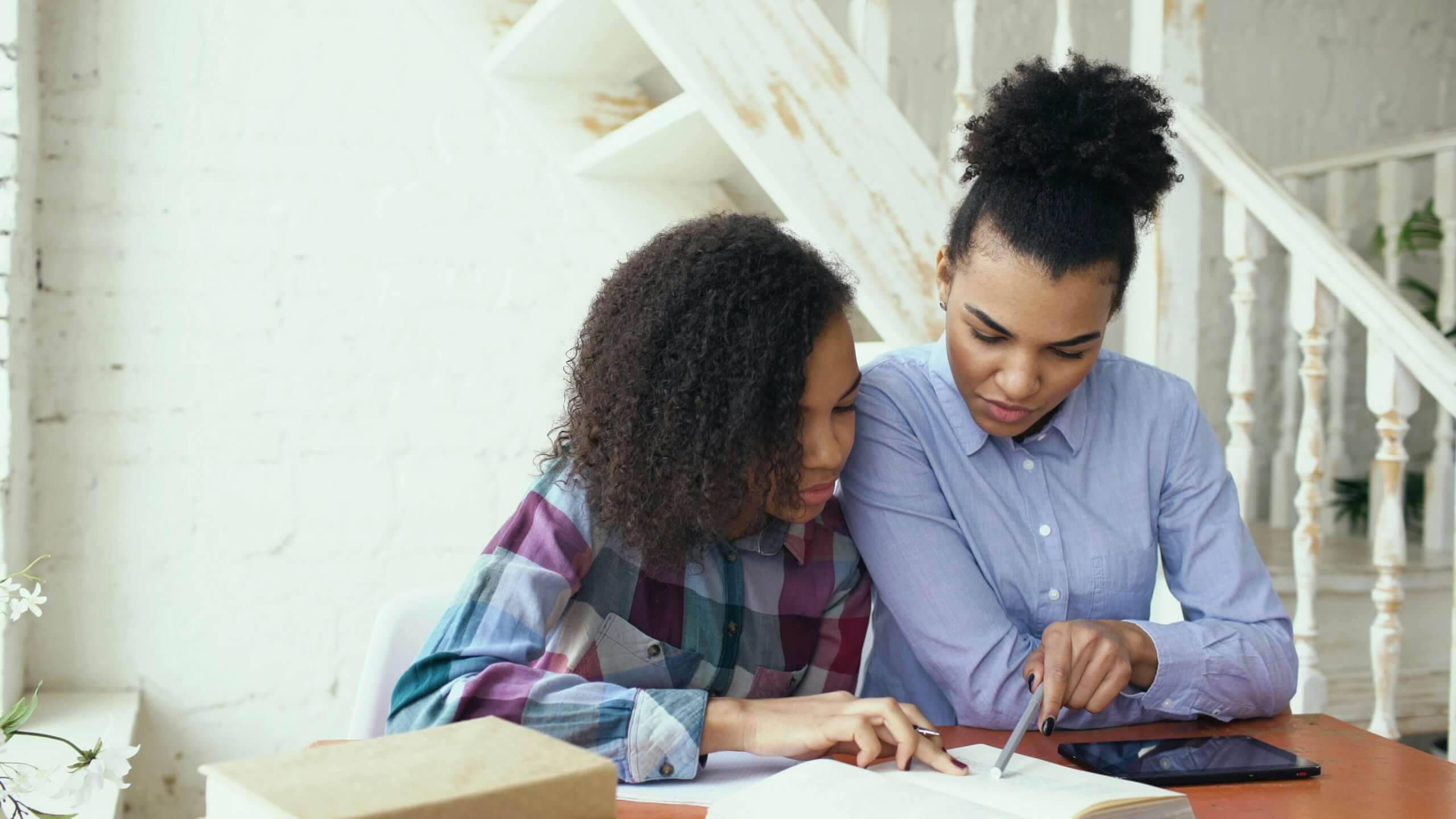 Teen learning about puberty with parent support showing effective communication strategies from therapy for ADHD near Somerville, NJ. Brave Minds ADHD therapist near Somerville, NJ offers neurodivergent NJ support in Scotch Plains (07076, 07066, 07090) and Branchburg (08853, 08821, 08876) helping families navigate the neurodivergent journey NJ with specialized puberty NJ guidance.