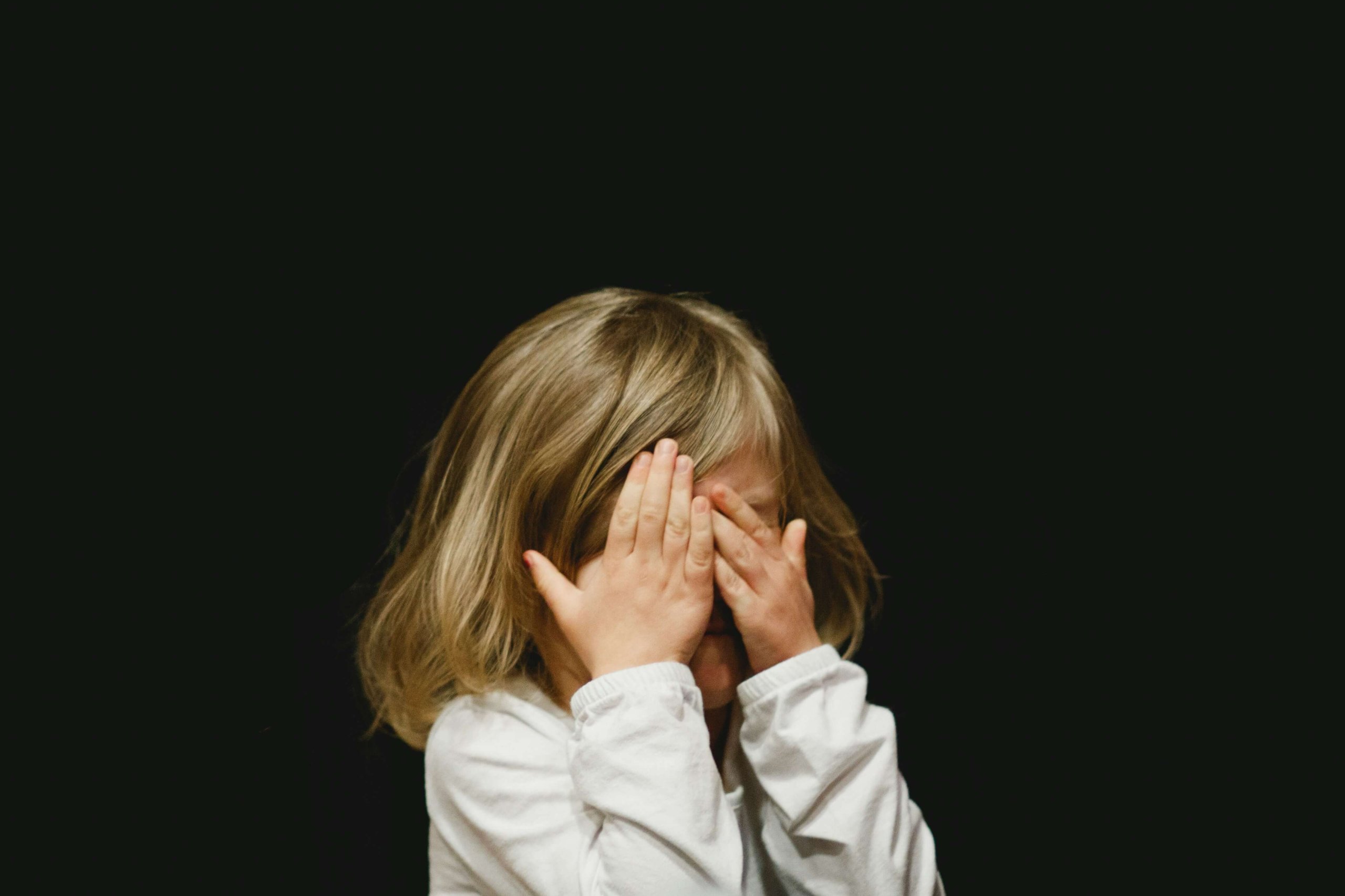 Child showing signs of anxiety and emotional distress related to school challenges in Scotch Plains. Serving Scotch Plains families with compassionate support for back-to-school anxiety and emotional wellness.