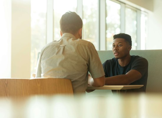 A teenage boy speaks with a therapist in a supportive setting in Scotch Plains, NJ. Serving Branchburg, Somerville, and nearby towns helping parents understand the signs a teen needs therapy and how to help a teenager with anxiety and depression.