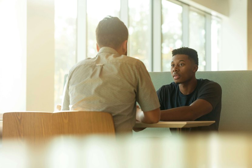A teenage boy speaks with a therapist in a supportive setting in Scotch Plains, NJ. Serving Branchburg, Somerville, and nearby towns helping parents understand the signs a teen needs therapy and how to help a teenager with anxiety and depression.